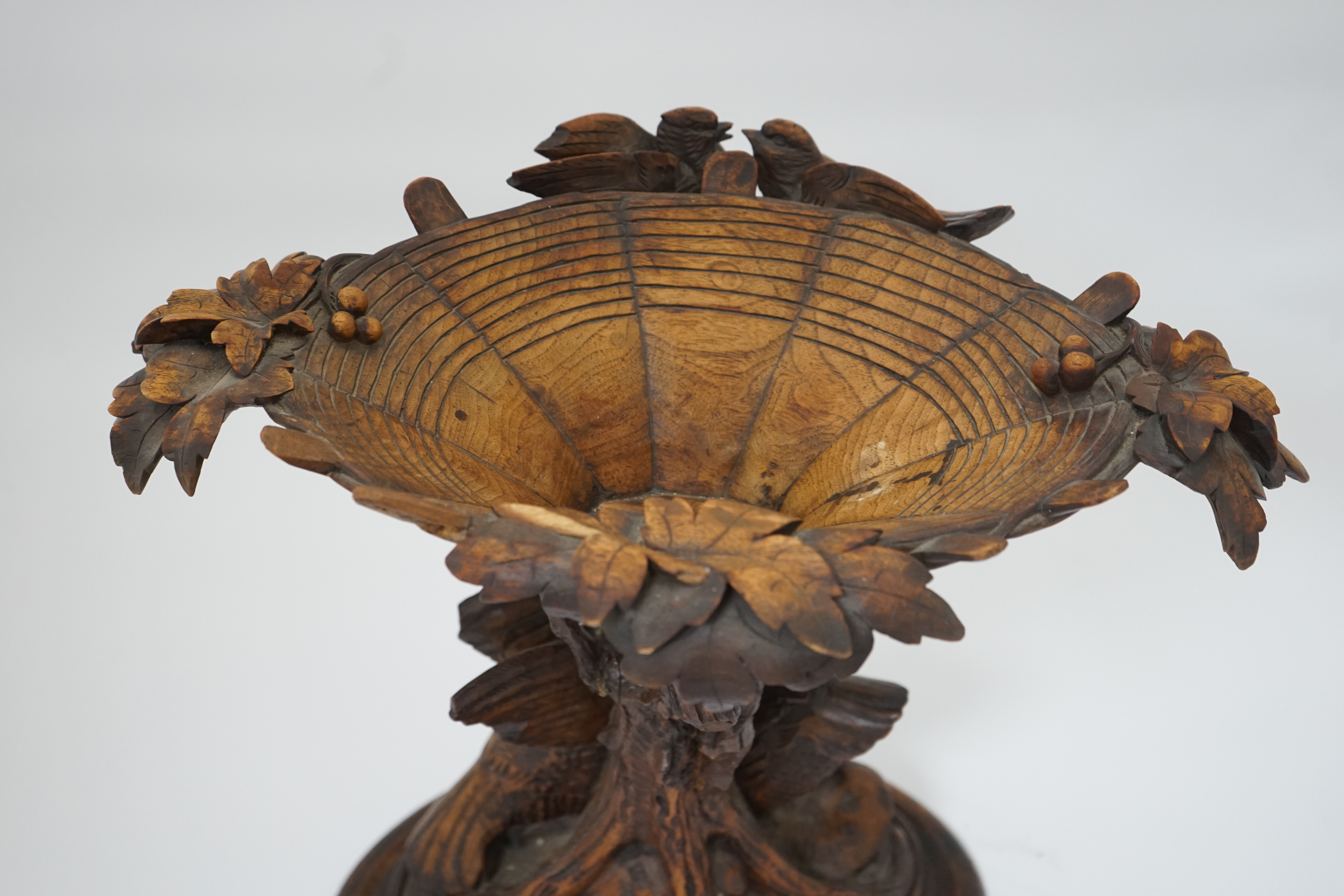 A 19th century Black Forest carved wood centrepiece